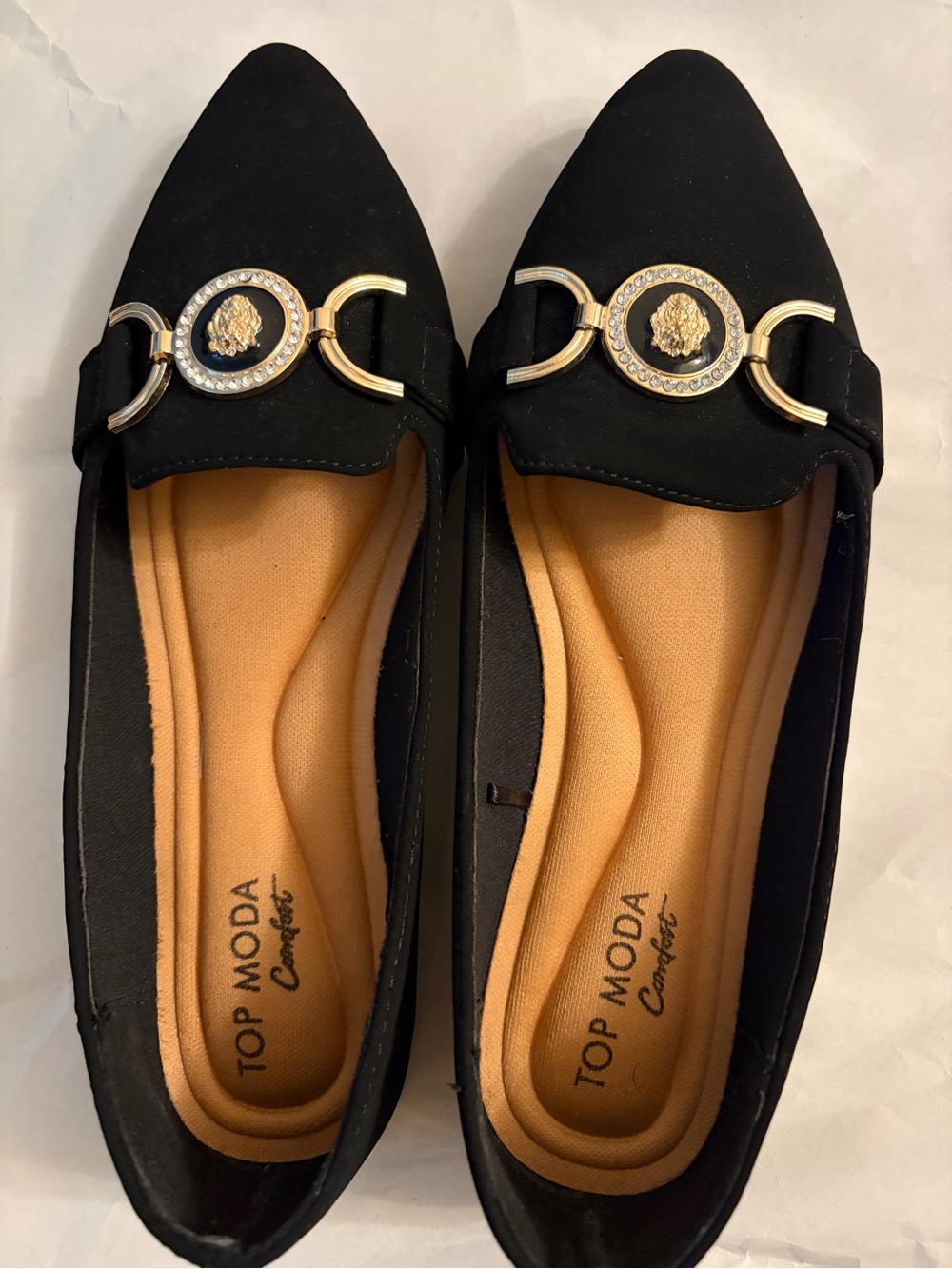 TOP Moda Black Pointed Flats with Gold Medallion Accent